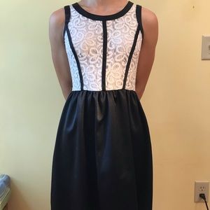 White lace with black detail dress